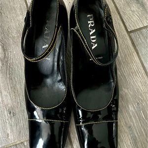 Prada size 39 patent leather 2 1/2” heels with light yellow stitching